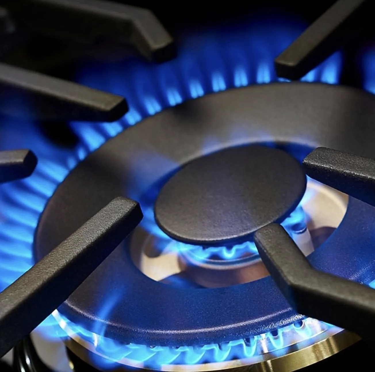 Blue flame on a gas hob burner